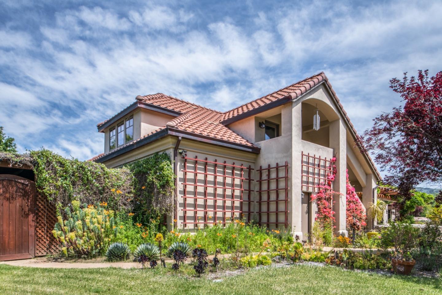 8630 River Meadows Road Carmel, CA 93923 - Photo 43 of 50 a front view of a house with a yard