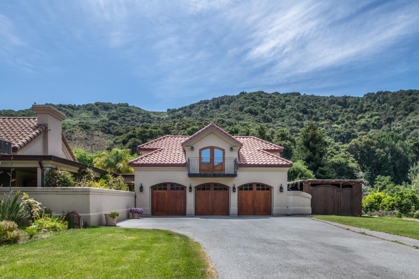 8630 River Meadows Road Carmel, CA 93923 - Photo 49 of 50 a front view of a house with a garden and plants