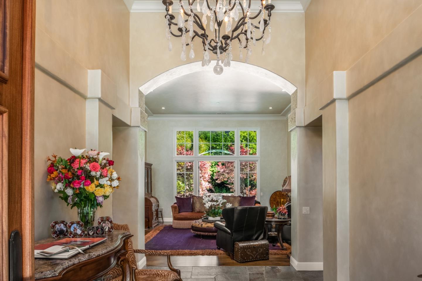 8630 River Meadows Road Carmel, CA 93923 - Photo 5 of 50 a living room with furniture and a potted plant