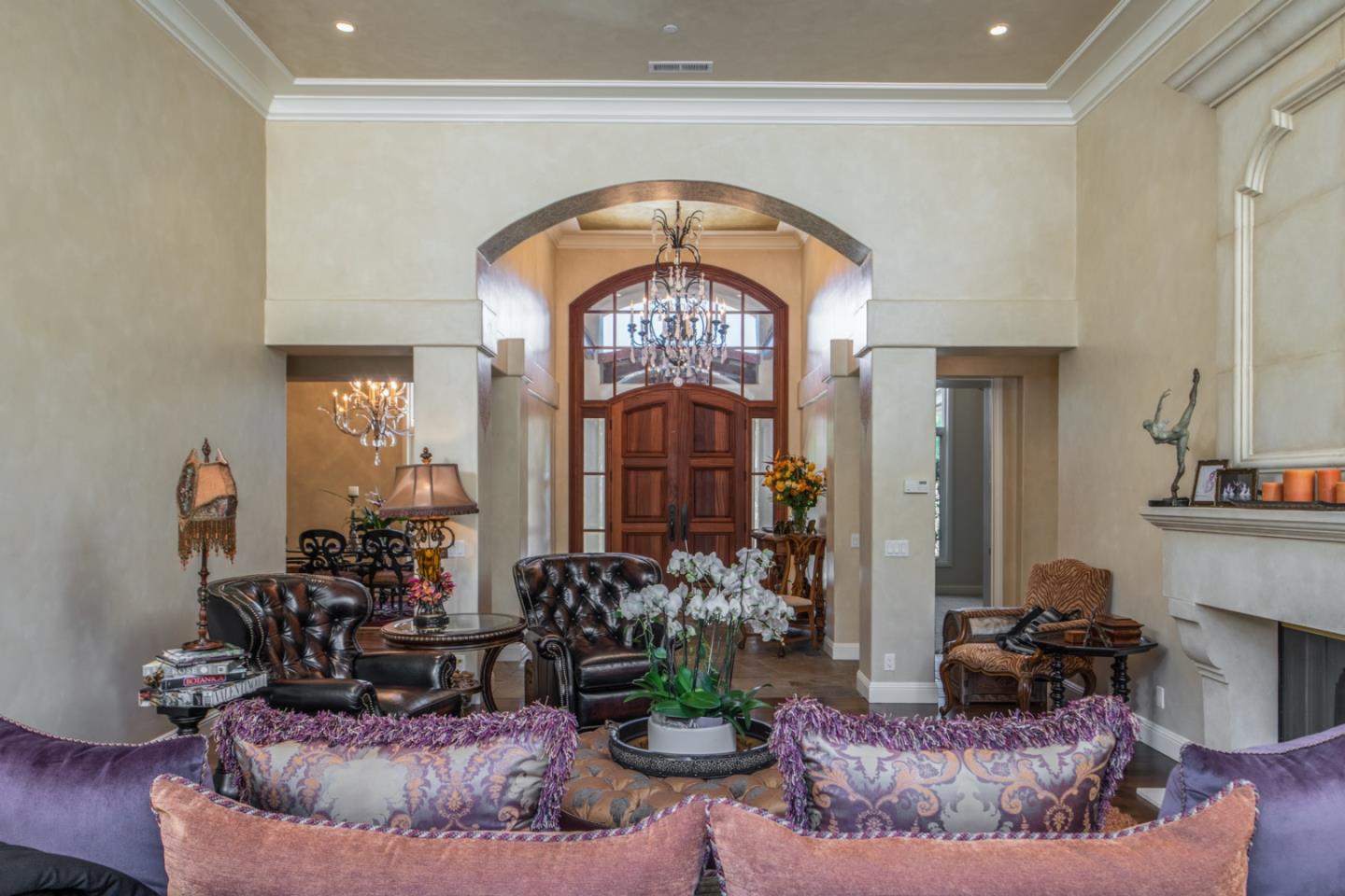 8630 River Meadows Road Carmel, CA 93923 - Photo 6 of 50 a living room with furniture and a fireplace