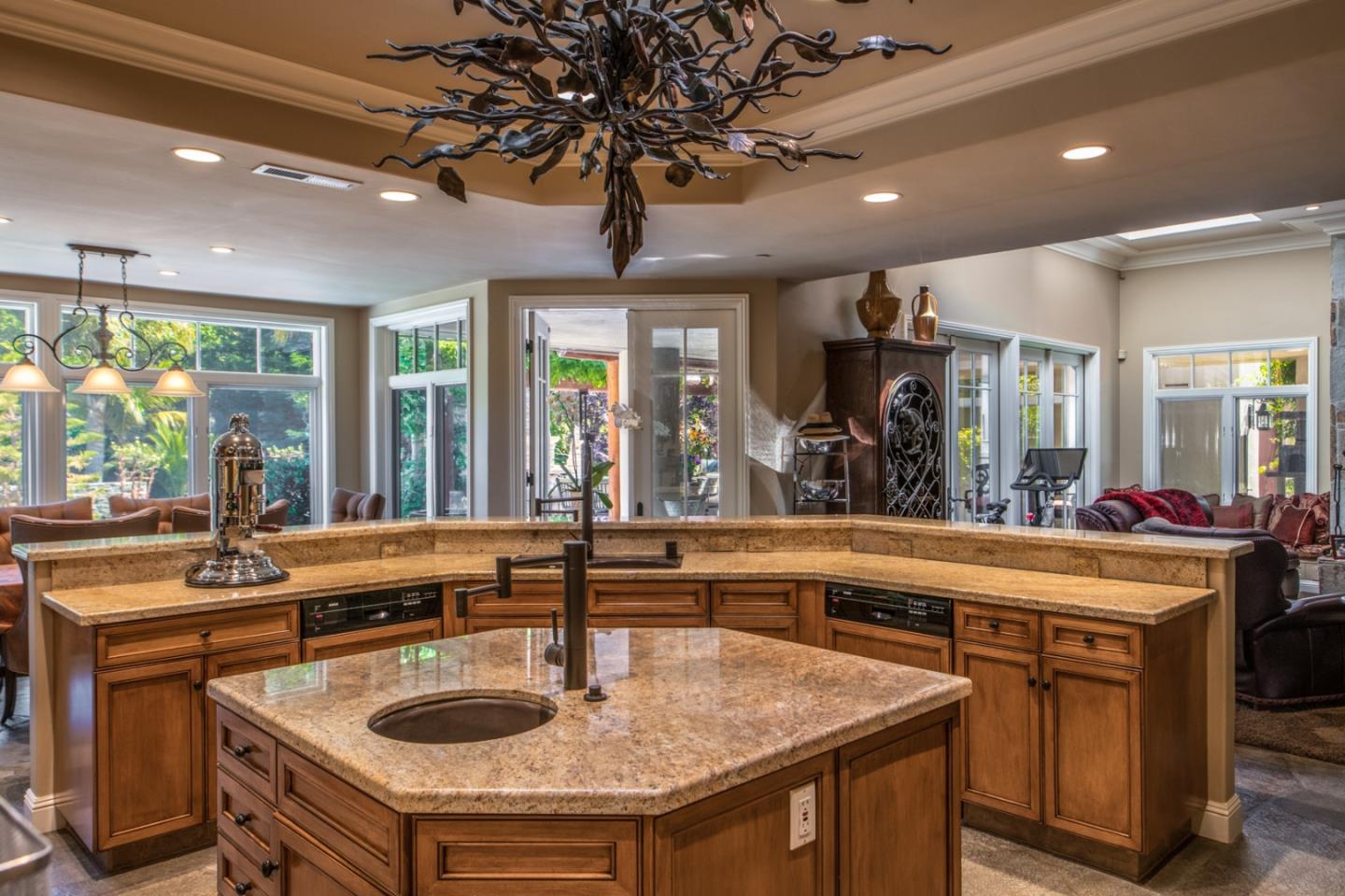 8630 River Meadows Road Carmel, CA 93923 - Photo 10 of 50 a kitchen with a stove a sink and a refrigerator