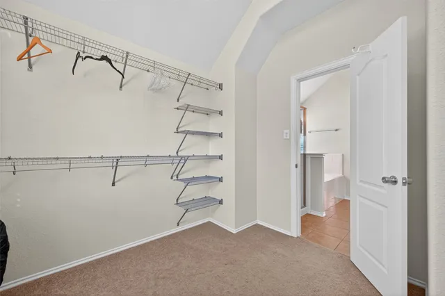 a view of a room with racks on the wall