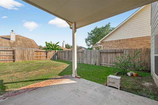a view of a backyard with garden