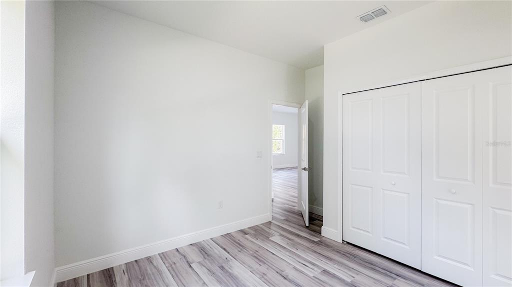 15625 Southwest 37th Circle Ocala, FL 34473 - Photo 17 of 27 a view of a room with wooden floor