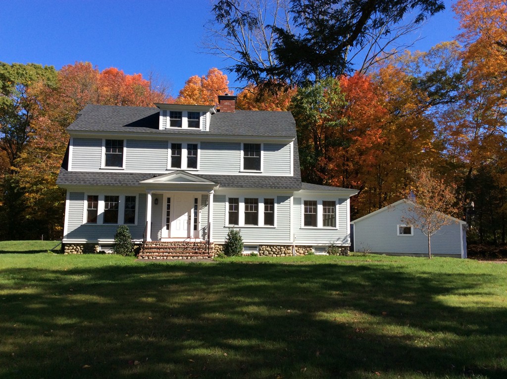 4 Maynard Road Sudbury, MA 01776 - Photo 1 of 22 a front view of a house with a garden