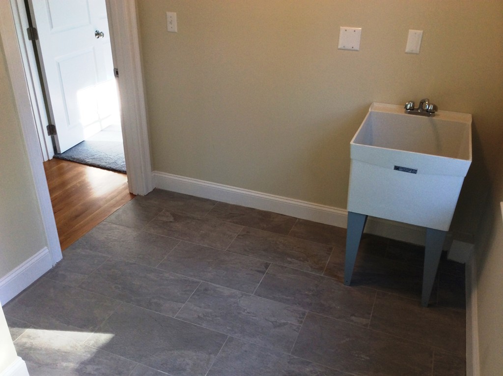 4 Maynard Road Sudbury, MA 01776 - Photo 14 of 22 a room with a bench