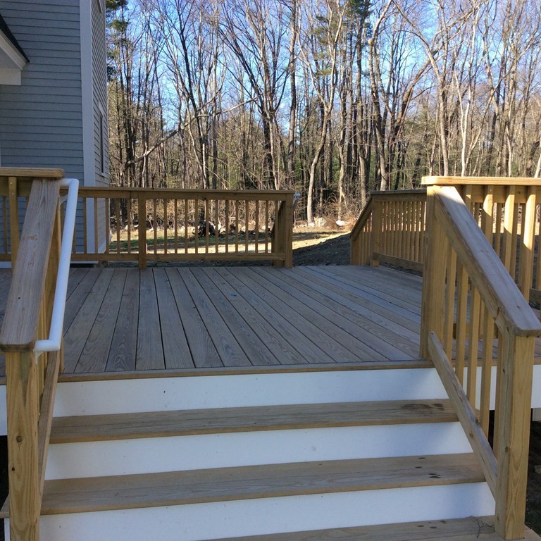 4 Maynard Road Sudbury, MA 01776 - Photo 17 of 22 a view of entryway with wooden floor