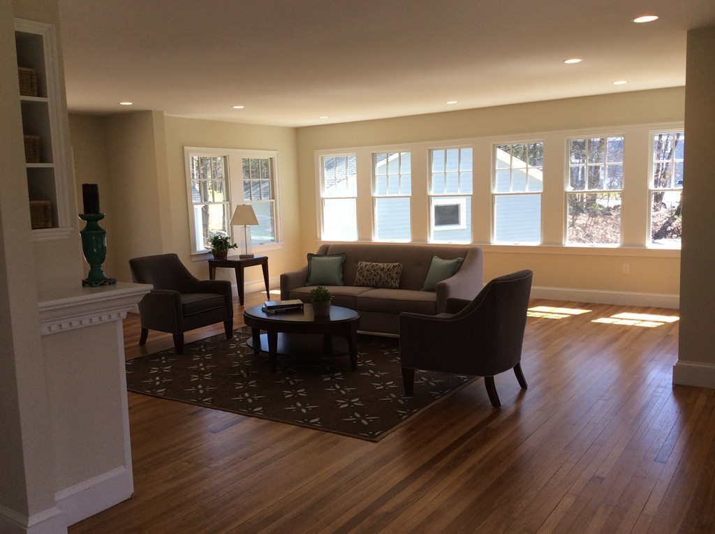 4 Maynard Road Sudbury, MA 01776 - Photo 4 of 22 a living room with furniture and a wooden floor
