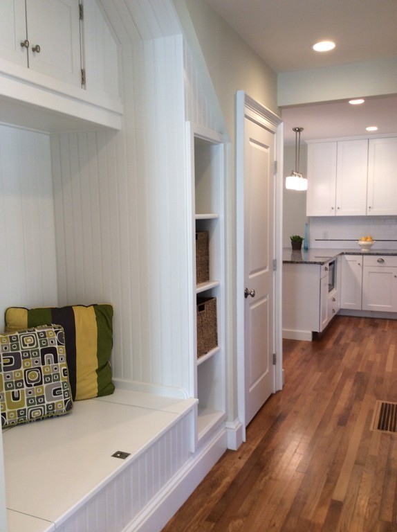 4 Maynard Road Sudbury, MA 01776 - Photo 6 of 22 a kitchen with stainless steel appliances granite countertop a refrigerator a stove and a wooden floors