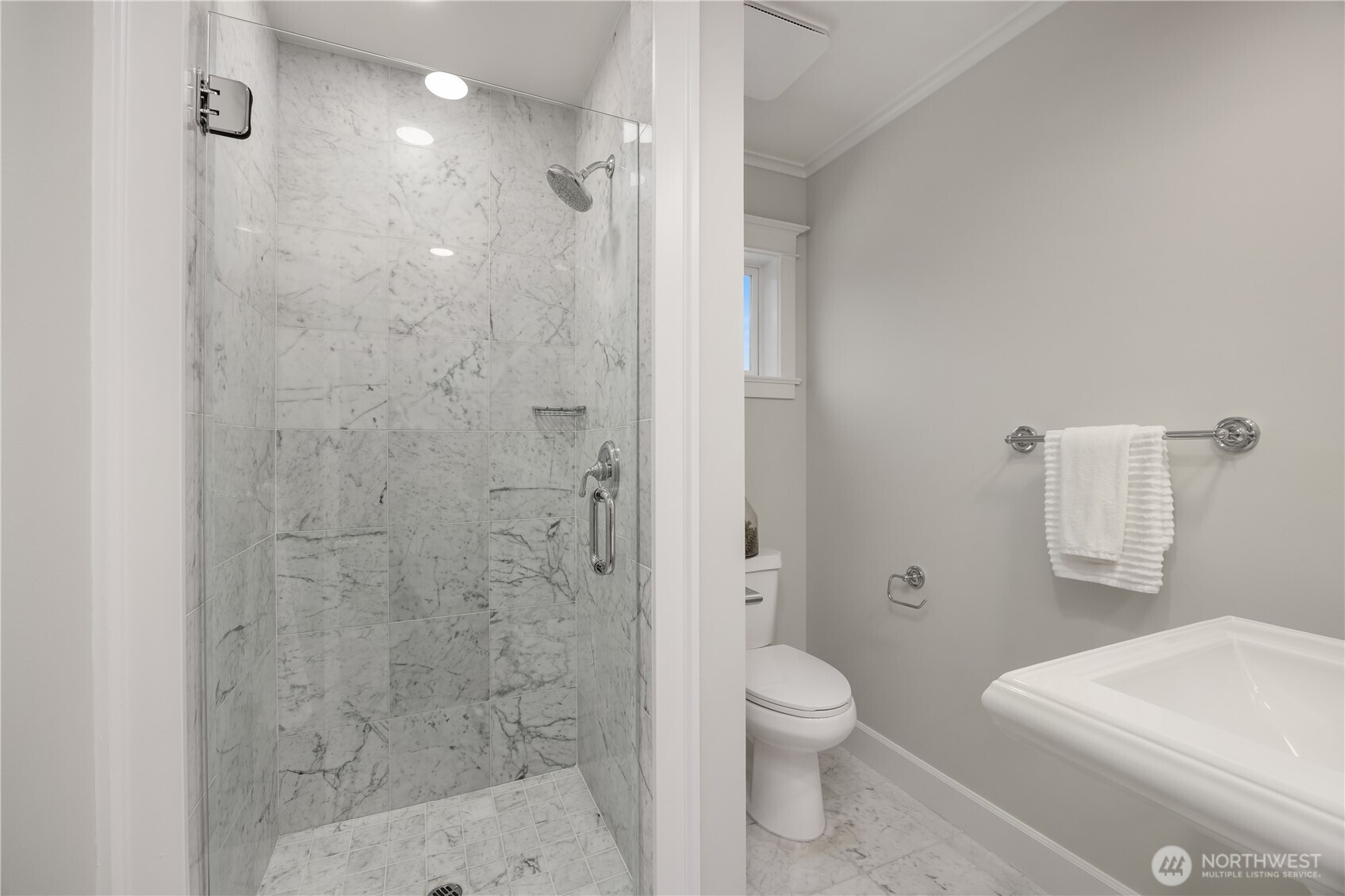 525 West Prospect Street, Unit A Seattle, WA 98119 - Photo 20 of 33 a bathroom with a toilet sink and shower