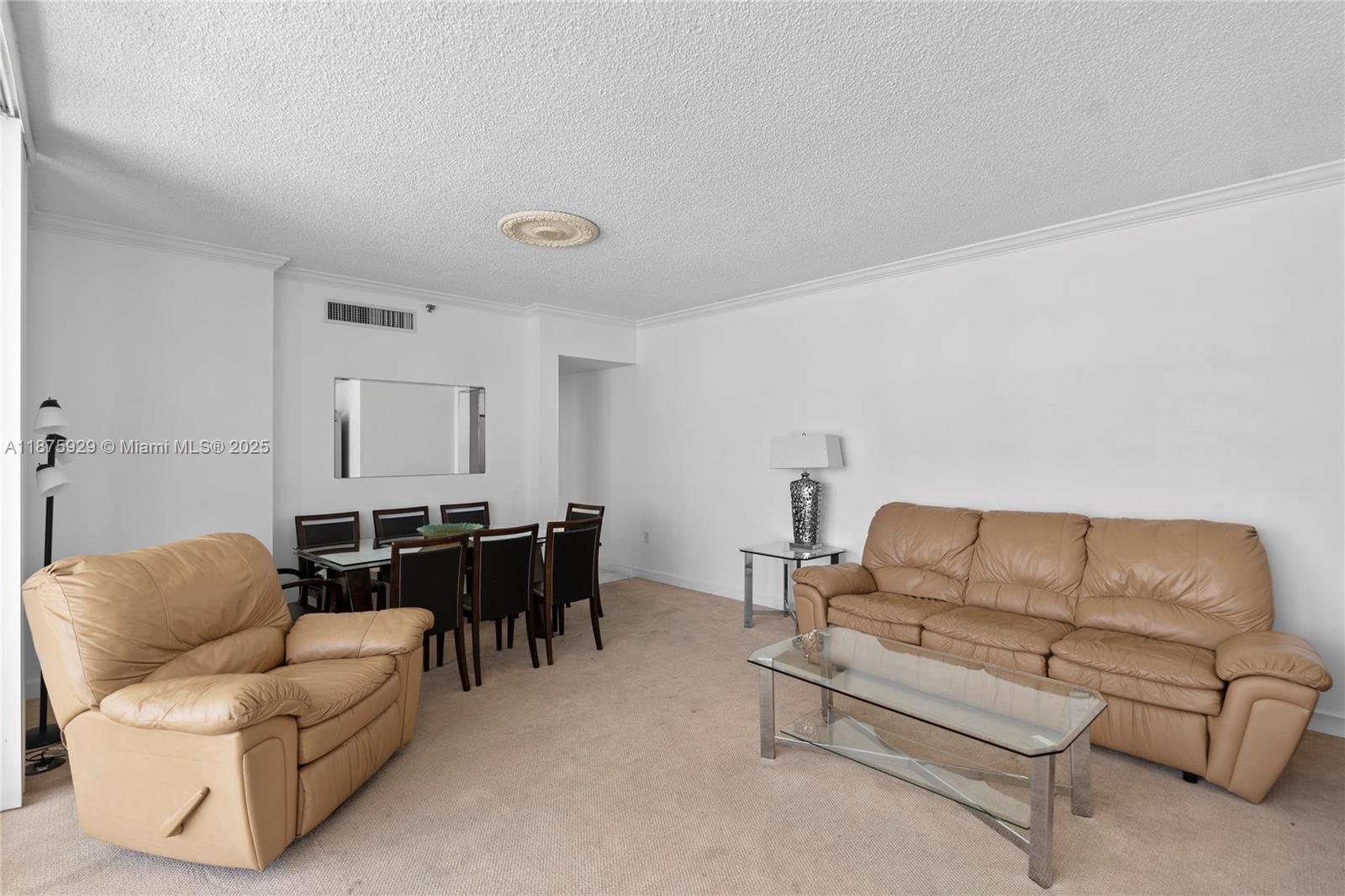 4201 Collins Avenue, Unit 701 Miami Beach, FL 33140 - Photo 14 of 61 a living room with furniture