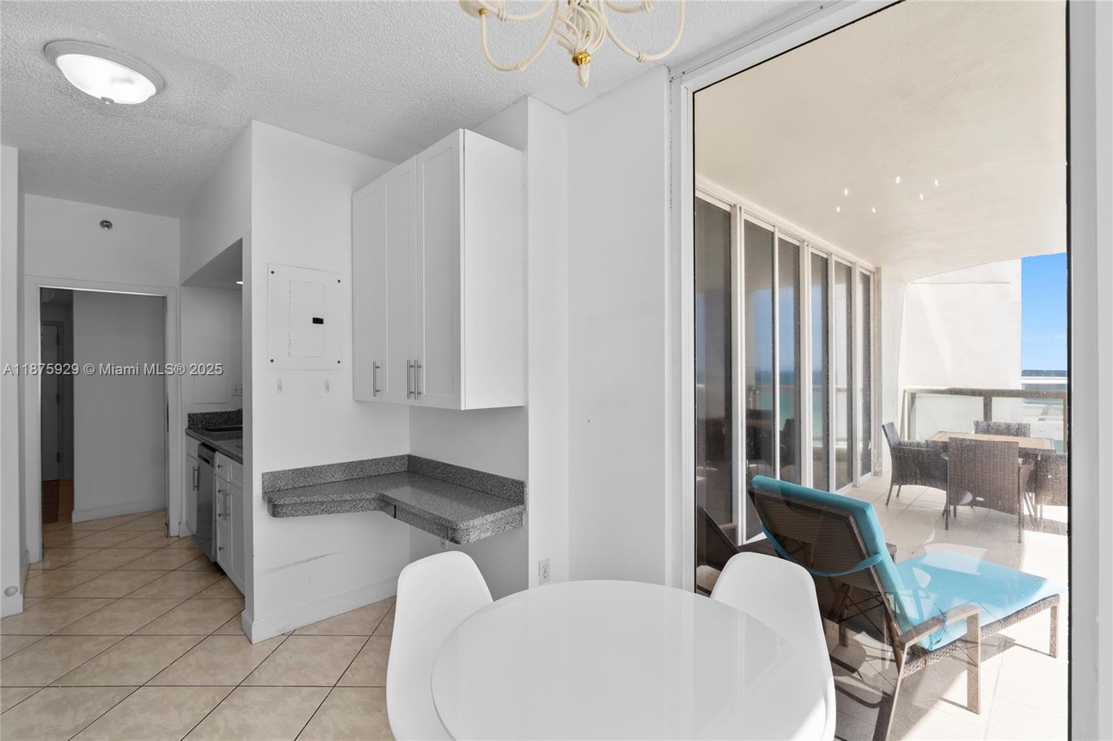 4201 Collins Avenue, Unit 701 Miami Beach, FL 33140 - Photo 20 of 61 a living room with furniture and a large window