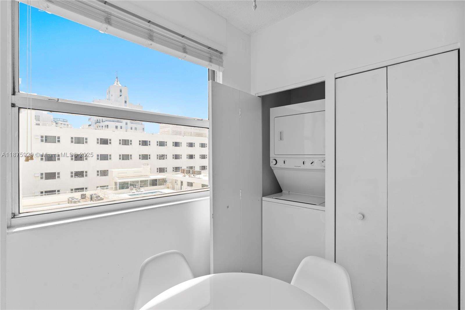 4201 Collins Avenue, Unit 701 Miami Beach, FL 33140 - Photo 33 of 61 a bathroom with a toilet a sink and a mirror