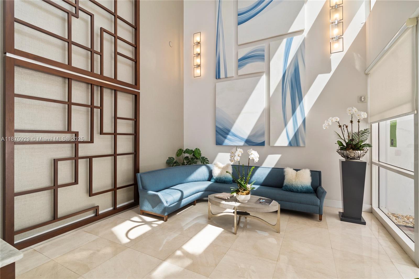 4201 Collins Avenue, Unit 701 Miami Beach, FL 33140 - Photo 43 of 61 a living room with furniture and wooden floor