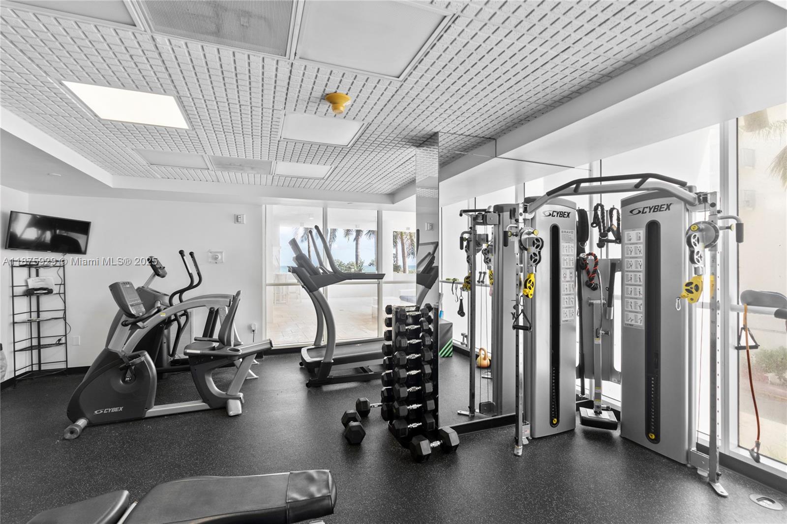 4201 Collins Avenue, Unit 701 Miami Beach, FL 33140 - Photo 45 of 61 a view of a room with gym equipment
