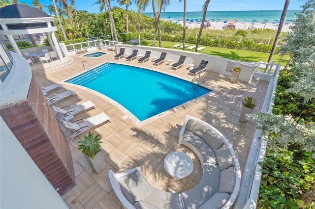 a bathroom with double vanity sinks and a mirror