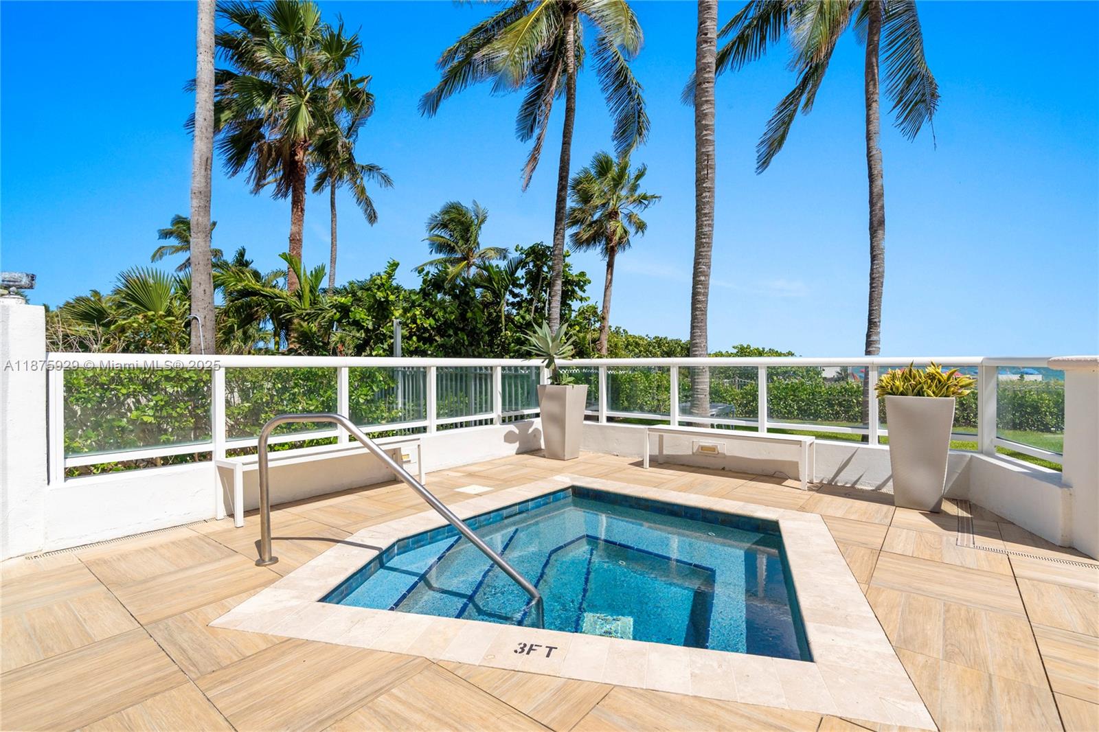 4201 Collins Avenue, Unit 701 Miami Beach, FL 33140 - Photo 49 of 61 a view of a swimming pool with a lounge chair