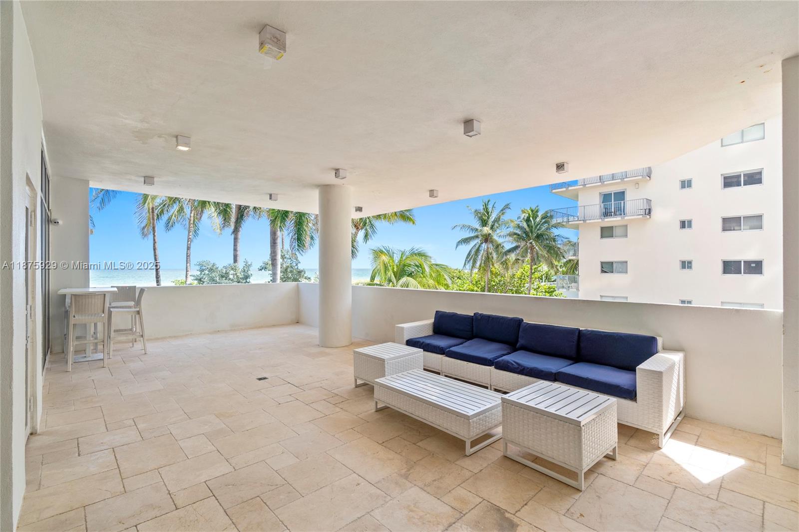 4201 Collins Avenue, Unit 701 Miami Beach, FL 33140 - Photo 53 of 61 a view of a couch in a living room