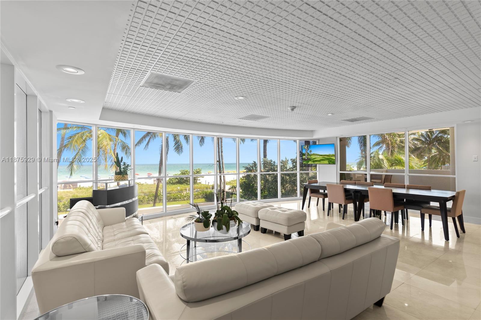 4201 Collins Avenue, Unit 701 Miami Beach, FL 33140 - Photo 55 of 61 a living room with furniture and a large window