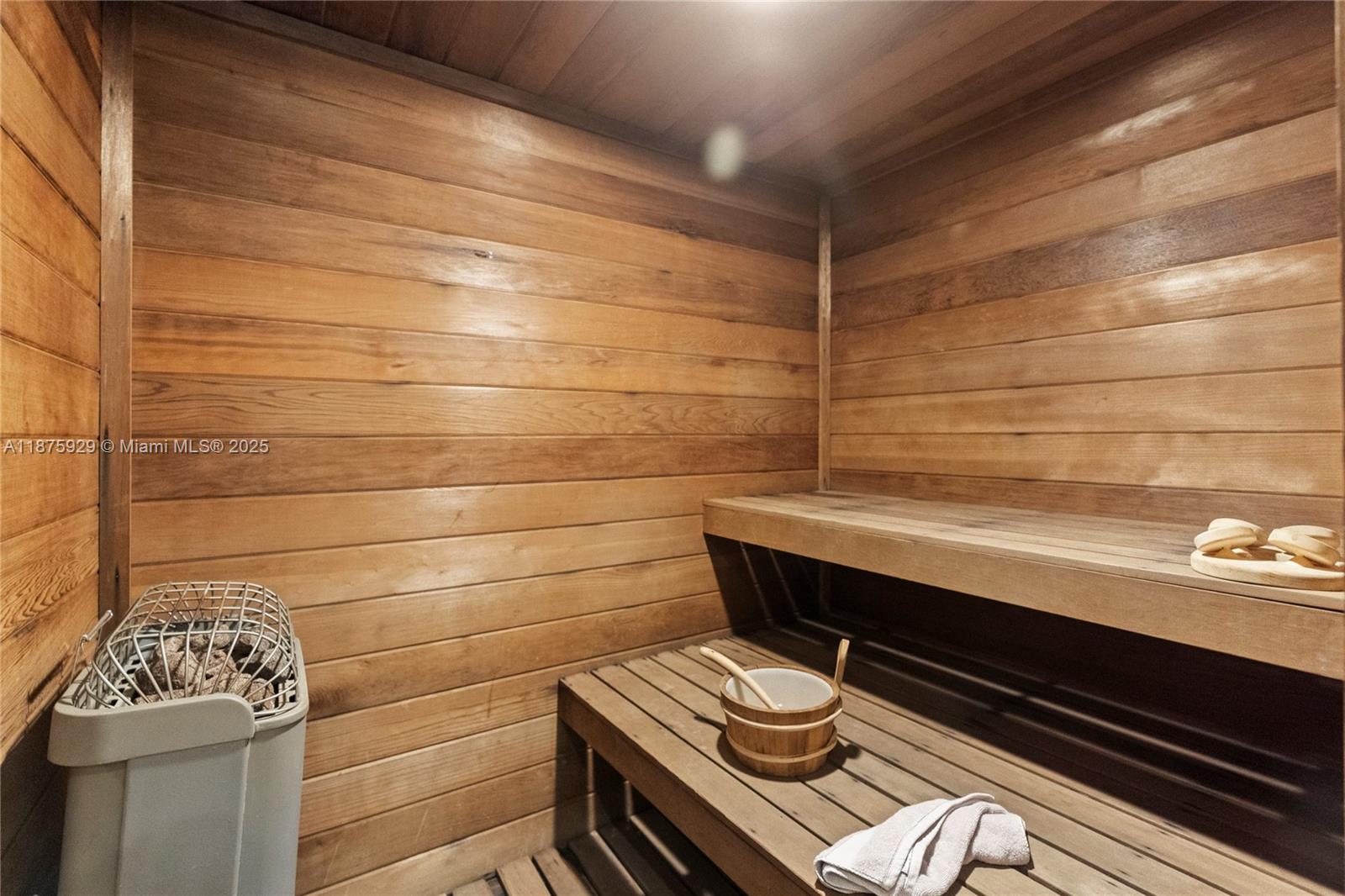 4201 Collins Avenue, Unit 701 Miami Beach, FL 33140 - Photo 58 of 61 a bathroom with a sink and a toilet