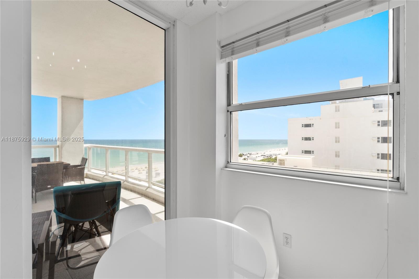 4201 Collins Avenue, Unit 701 Miami Beach, FL 33140 - Photo 10 of 61 a view of a dining room with furniture window and outside view