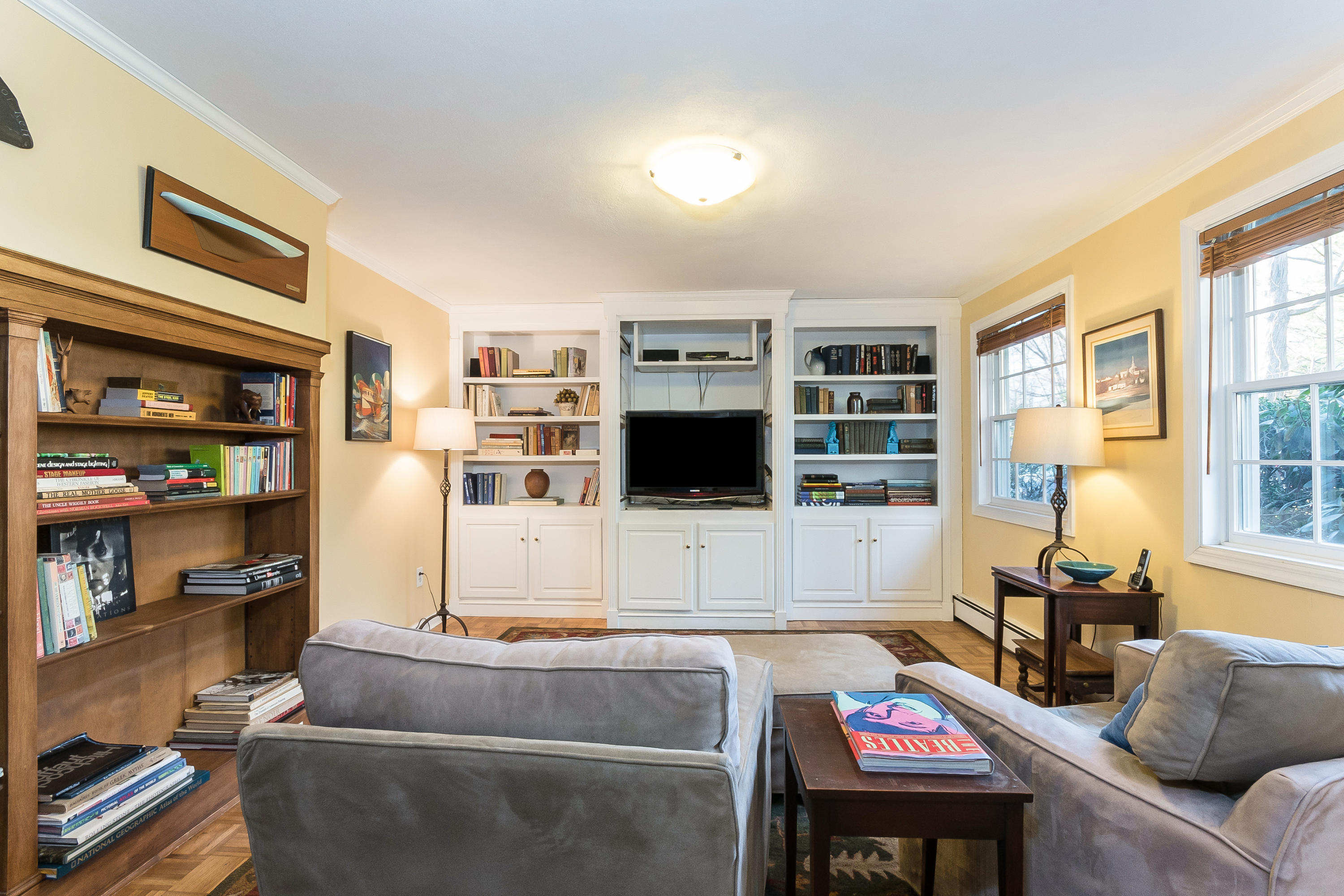 26 Stanton Road Darien, CT 06820 - Photo 31 of 40 a living room with furniture and a flat screen tv