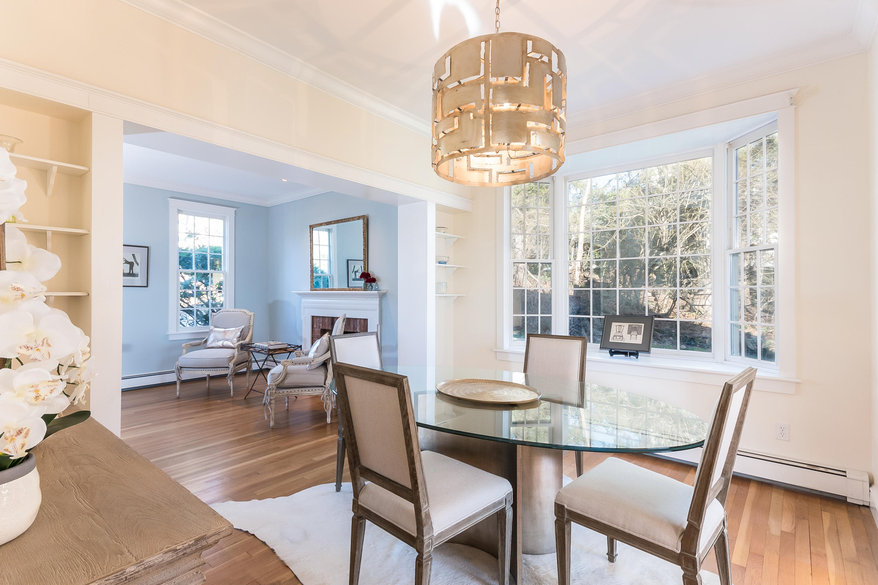 26 Stanton Road Darien, CT 06820 - Photo 9 of 40 a view of a dining room with furniture wooden floor and chandelier
