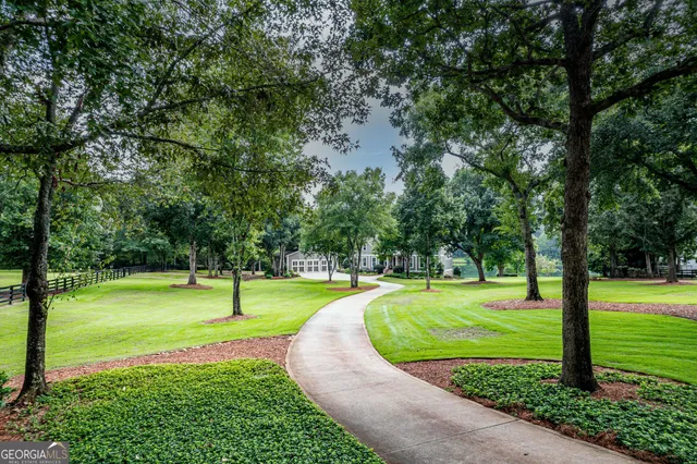 a living room with furniture fireplace and a flat screen tv