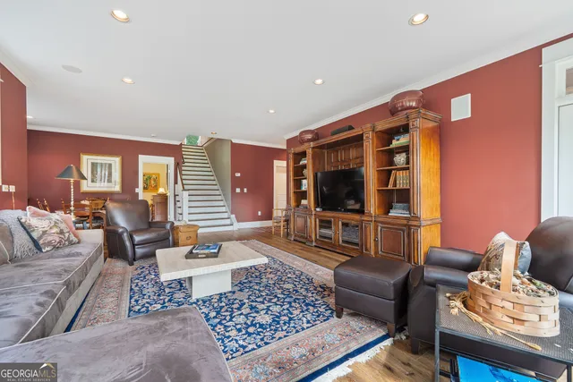 a view of a house with a yard table and chairs