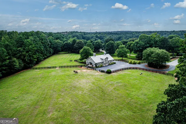 a lake view with a big yard and plants