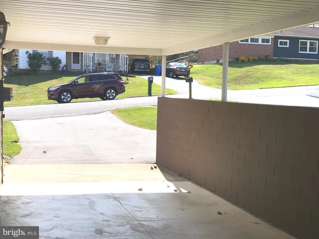 a view of a swimming pool with a yard