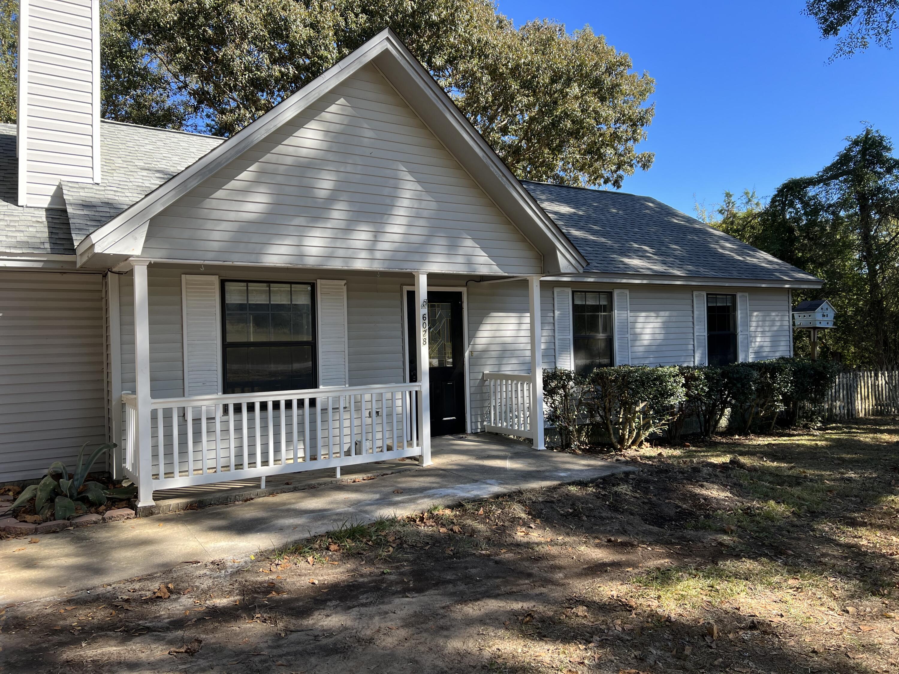 6028 Old Bethel Road Crestview, FL 32536 - Photo 2 of 16 a view of a house with a yard