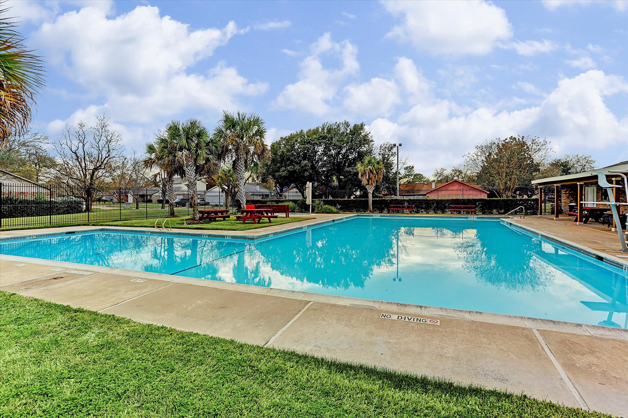 11207 Rousseau Drive Houston, TX 77065 - Photo 20 of 20 a view of a swimming pool with an outdoor seating and a yard