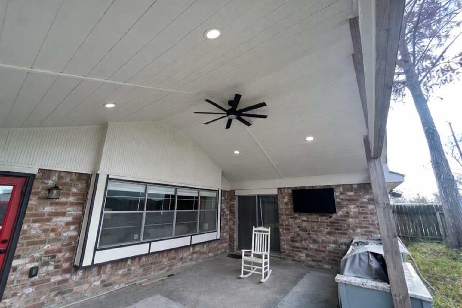 11207 Rousseau Drive Houston, TX 77065 - Photo 3 of 20 a view of a livingroom with furniture and a flat screen tv