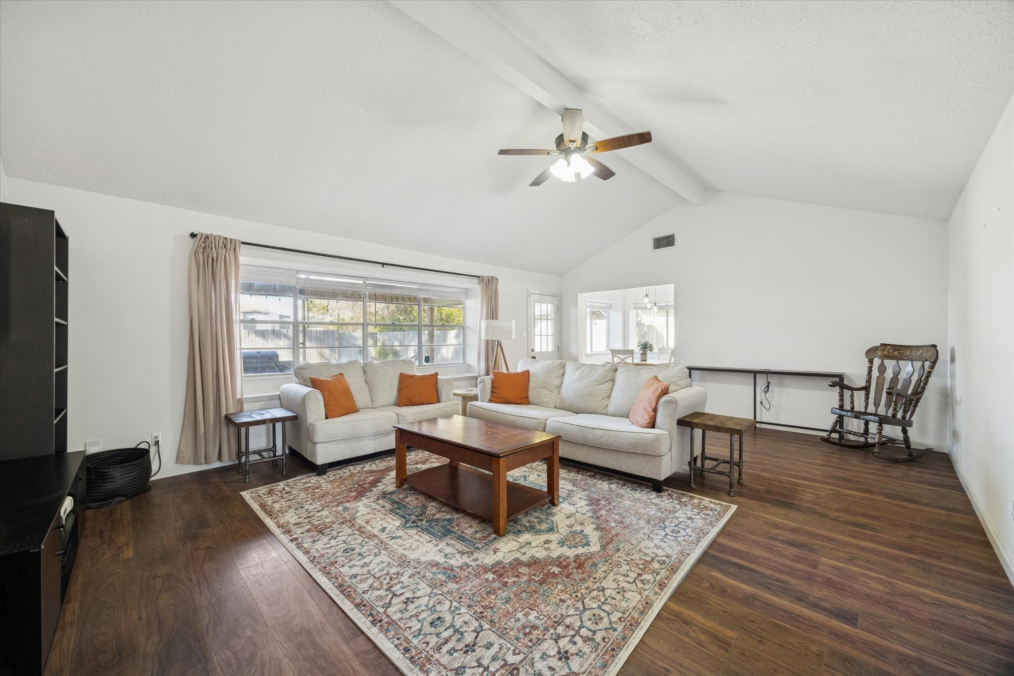 11207 Rousseau Drive Houston, TX 77065 - Photo 6 of 20 a living room with furniture and wooden floor