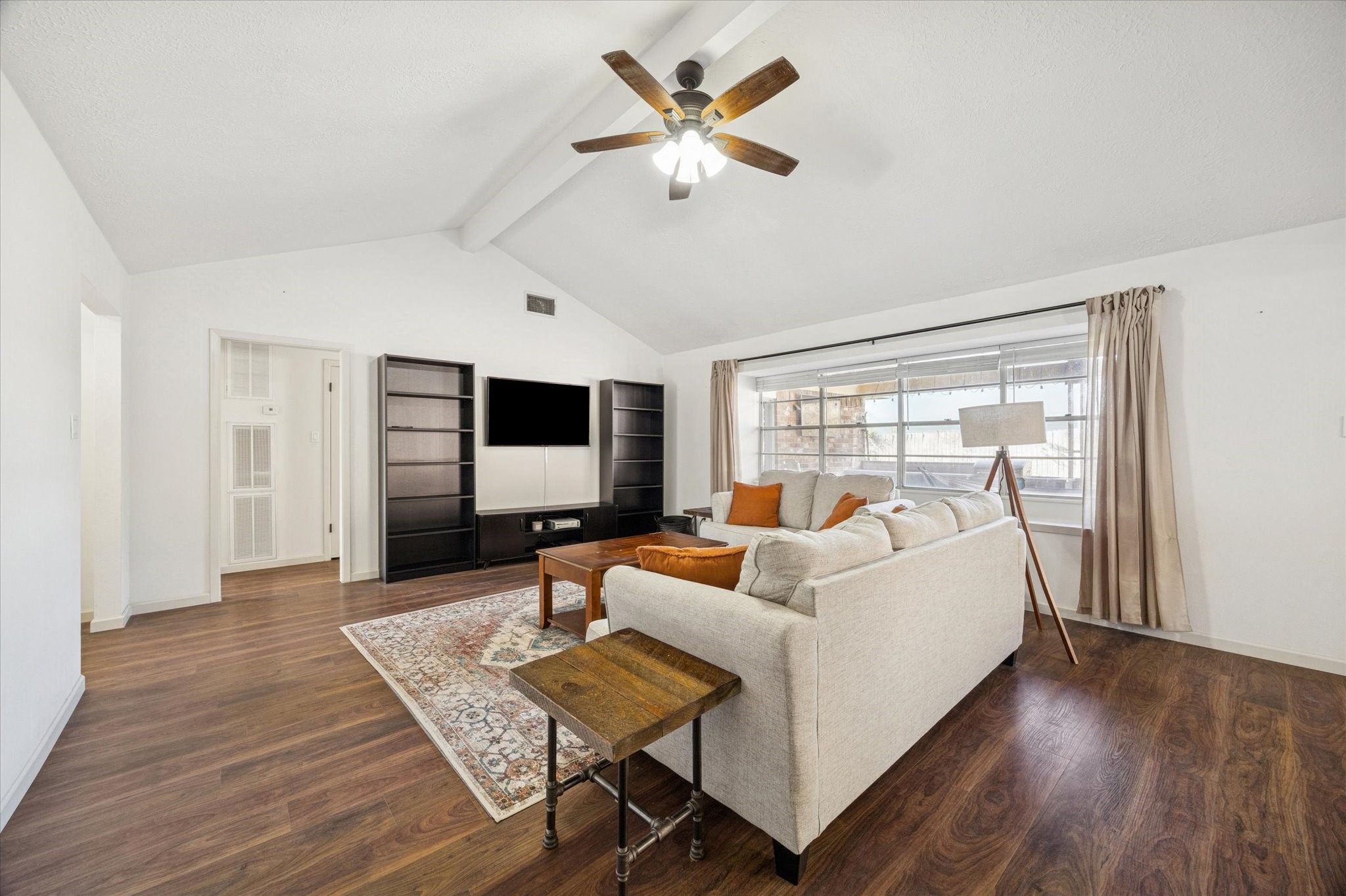 11207 Rousseau Drive Houston, TX 77065 - Photo 8 of 20 a living room with furniture and a large window