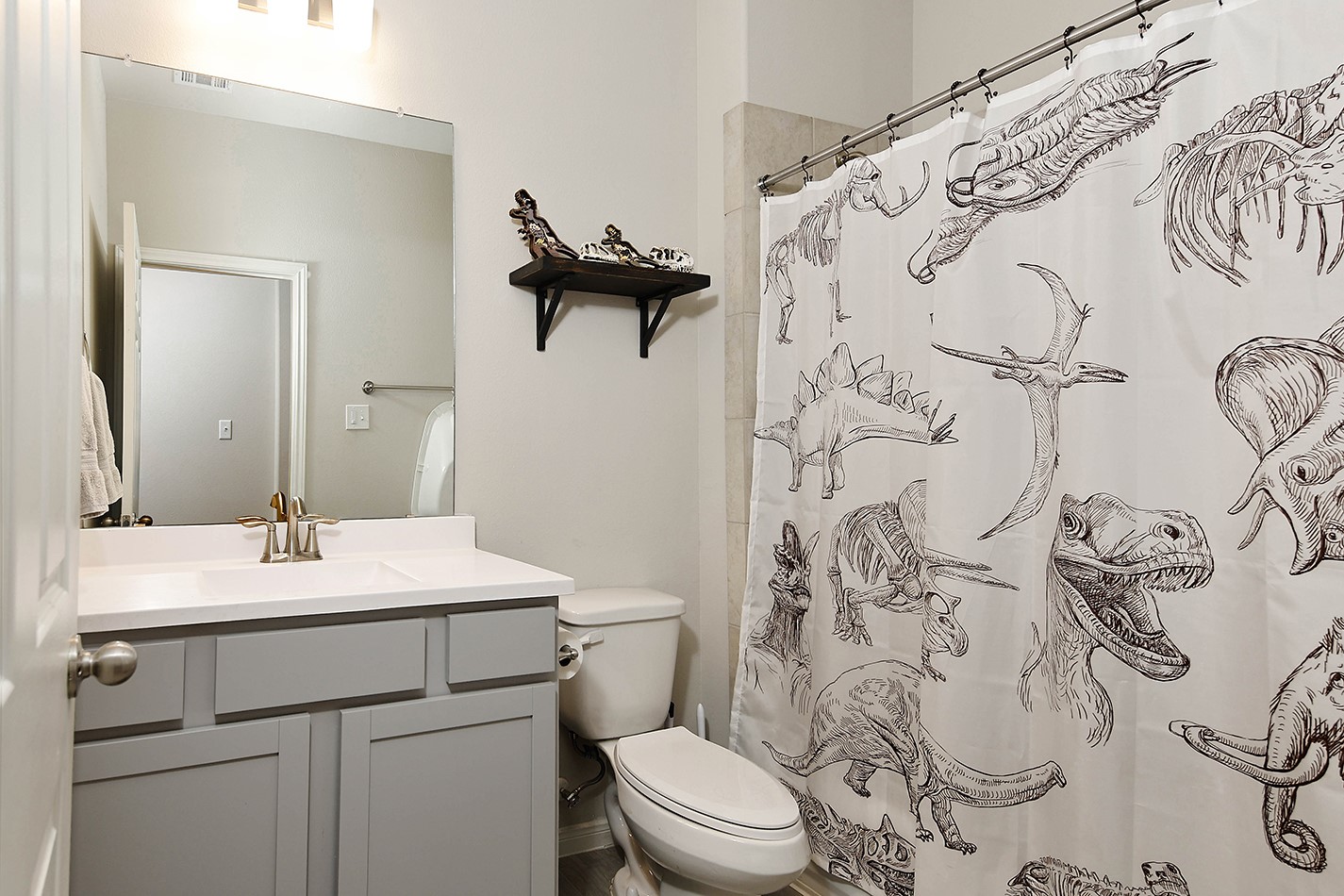 26324 Cooperstown Way Splendora, TX 77372 - Photo 17 of 23 a bathroom with a sink and a toilet