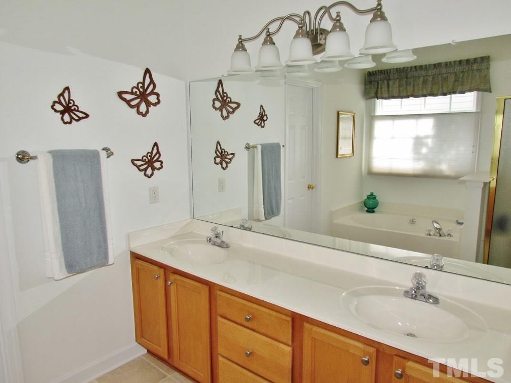 4720 Treadstone Court Raleigh, NC 27616 - Photo 11 of 25 Check out all this counter-space! Plenty of drawer and cabinet storage space.