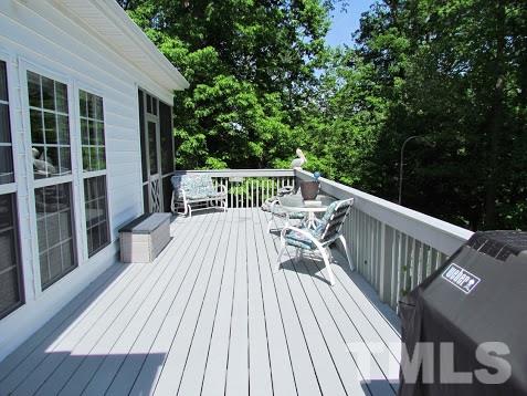 4720 Treadstone Court Raleigh, NC 27616 - Photo 14 of 25 Can you say fabulous? This gorgeous composite deck was added in 2014. This type decking continues to make your home maintenance free as well as lovely!
