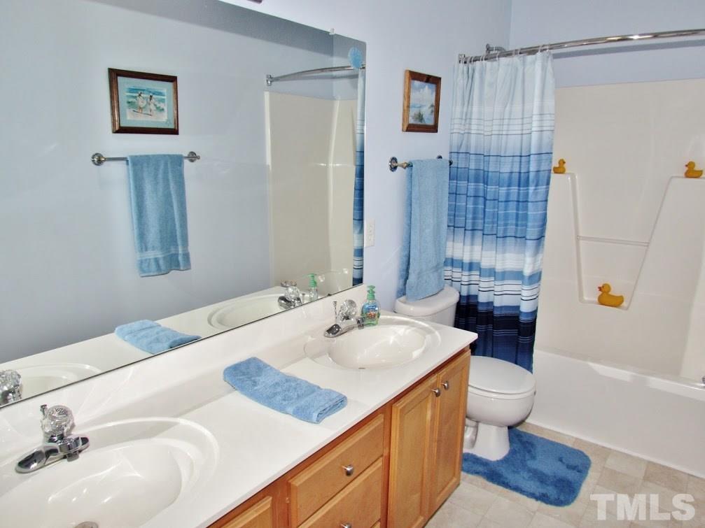 4720 Treadstone Court Raleigh, NC 27616 - Photo 17 of 25 What a hall bath!!! Check out all the counter, cabinet & drawer space! Don't miss the solatube. Great for light even if the electricity goes out. There's a solatube in the laundry room as well. The sellers have thought of just about everything.