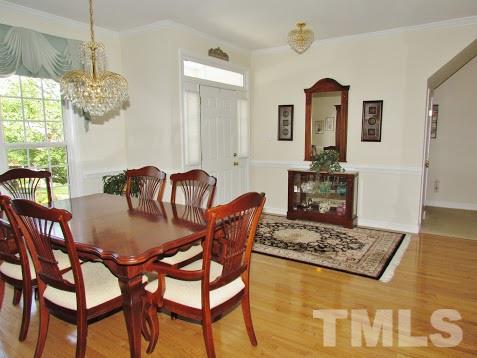 4720 Treadstone Court Raleigh, NC 27616 - Photo 23 of 25 You'll love this home the moment you step through the door. This home gets a lot of natural sunlight. The foyer offers hardwood floors and sets the tone for the open floor plan.