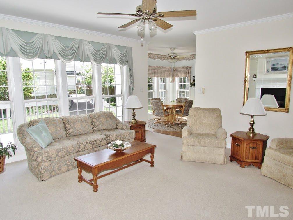 4720 Treadstone Court Raleigh, NC 27616 - Photo 5 of 25 Ceiling fans throughout the home keep the home cool and help keep your electric bill down.