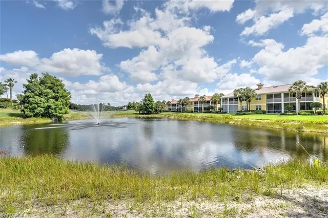 a view of a lake with a house