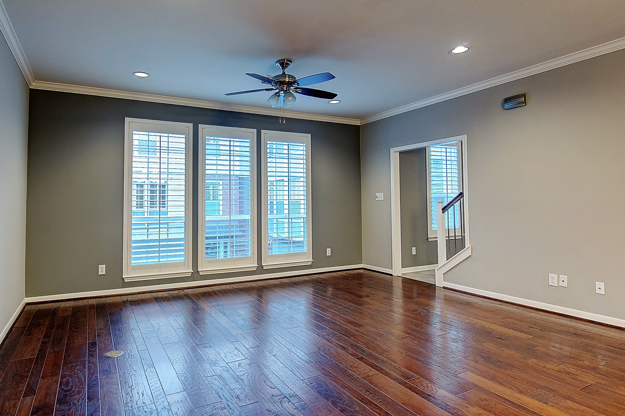 1408 West Webster Street Houston, TX 77019 - Photo 12 of 46 a view of an empty room with wooden floor and a window