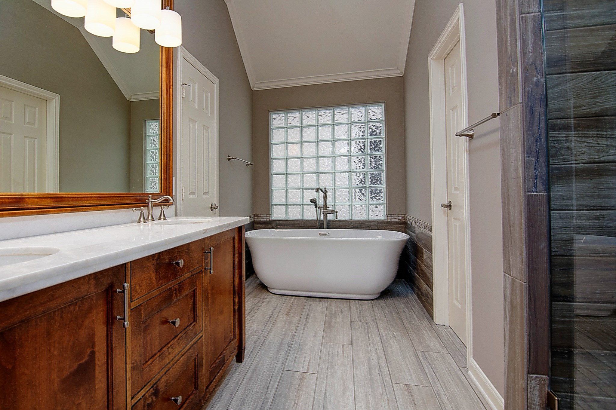 1408 West Webster Street Houston, TX 77019 - Photo 25 of 46 a large spacious bathroom with a large tub and sink