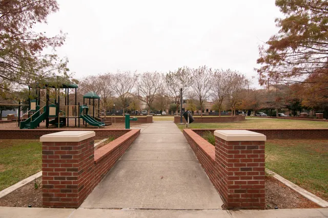 a view of a balcony with a fence