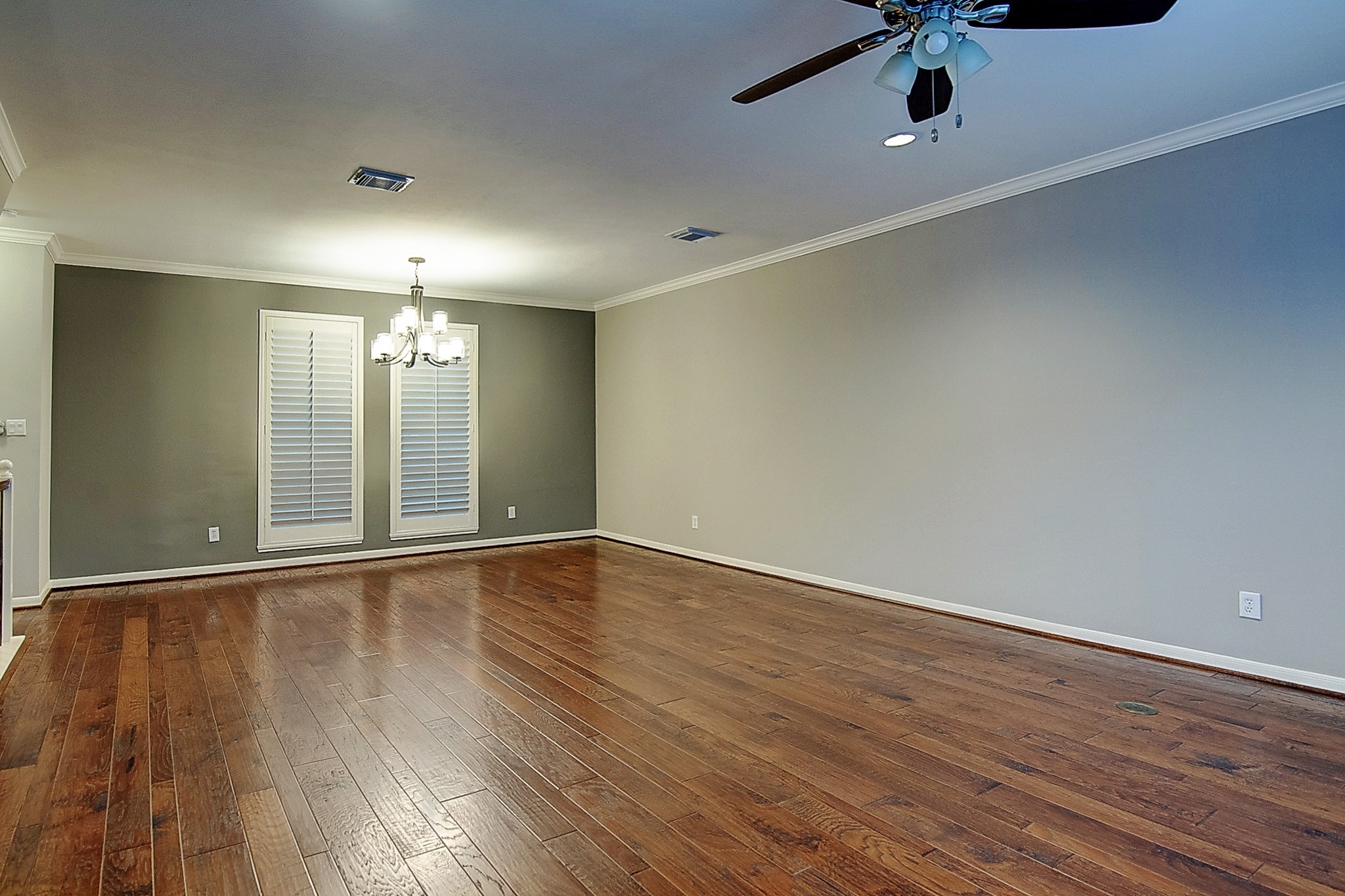 1408 West Webster Street Houston, TX 77019 - Photo 4 of 46 an empty room with a empty space and chandelier fan