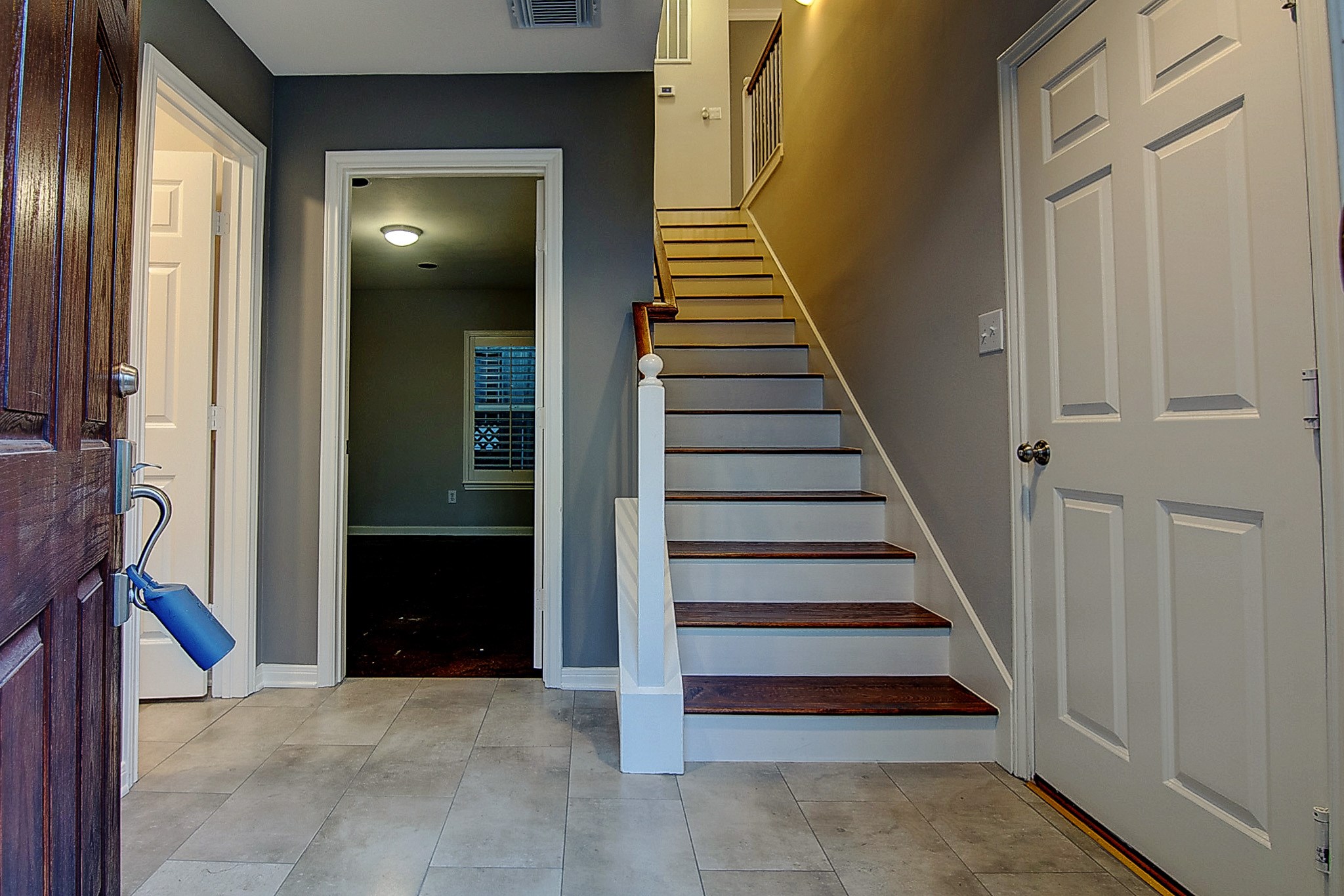 1408 West Webster Street Houston, TX 77019 - Photo 9 of 46 a view of entryway and gallery with wooden floor