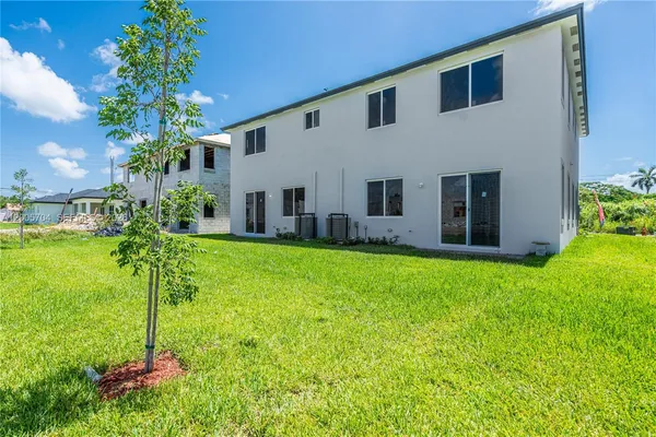 a house view with a garden space