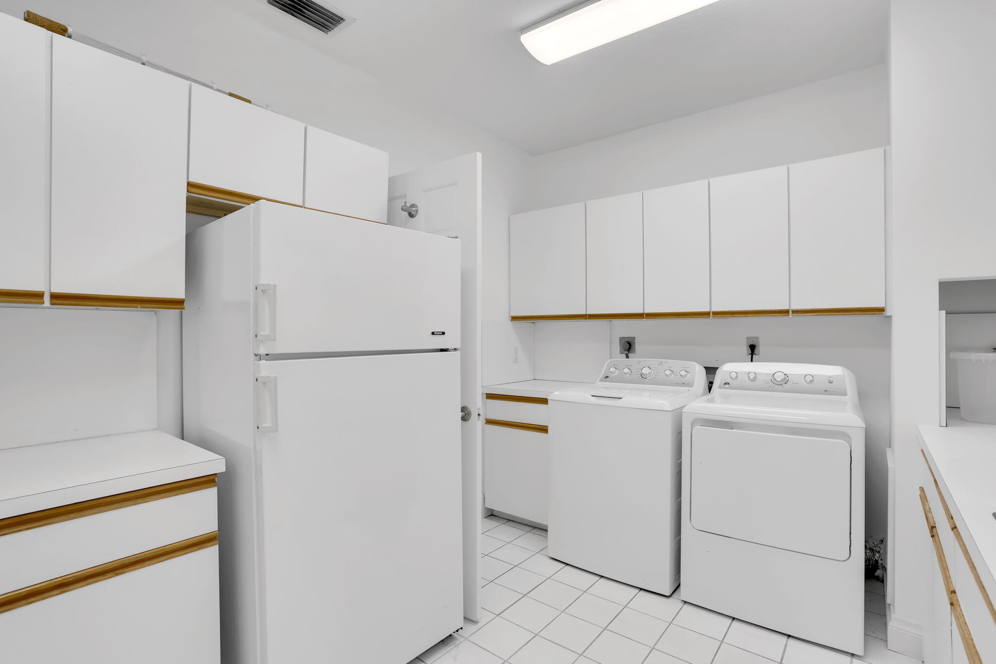2883 Banyan Blvd Circle Northwest Boca Raton, FL 33431 - Photo 54 of 80 Laundry room with refrigerator